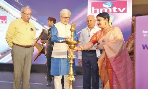 Governor Jishnu Dev Varma inaugurating the hmtv Matrushakti Awards 2025 function in Hyderabad on Monday. Hans India Editor-in-Chief V Ramu Sarma is at left