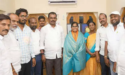 MLA felicitates Group 1 ranker