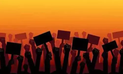 Municipal staff stage protest over tax dues