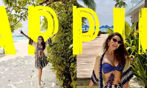 Rakulslays vacation fashion with bold and breezy looks