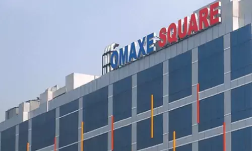 Real estate firm Omaxes share hits new 52-week low amid rising losses