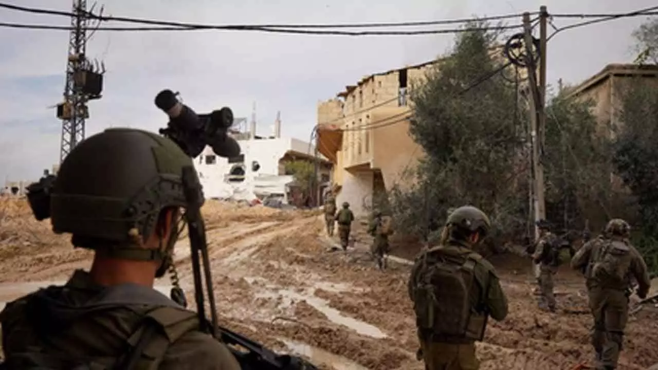 Israeli forces push deeper into Gaza, surrounding Rafah neighbourhood