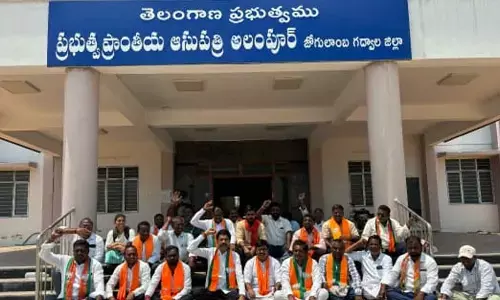 BJP Leaders Protest Demanding Immediate Opening of 100-Bed Area Hospital at Alampur X Road