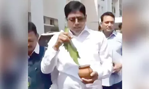 BJD MLAs sprinkle ‘Ganga Jal’ in Assembly