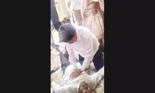 MLA Dr Tellam performs CPR, saves life