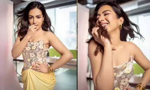 Catherine Tresareturns in style