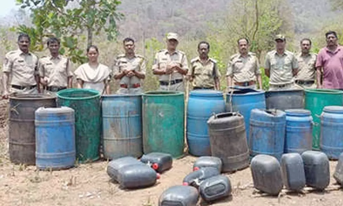 Odisha-AP police crack down on arrack Odisha-AP police crack down on arrack