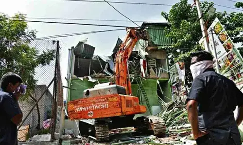 Illegal structures in Kokapet razed amid tight security