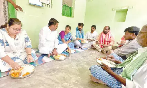 TGTDC chairman dines with fine rice beneficiary family