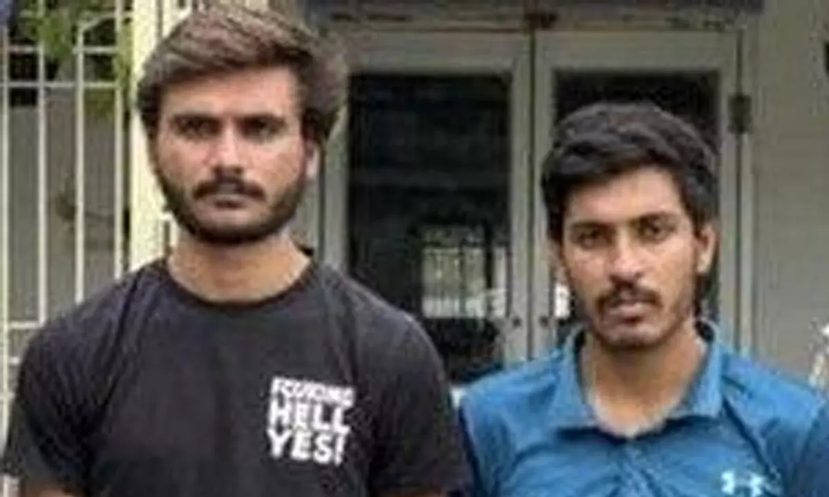 Two held for defrauding VC of Rs 14 lakh