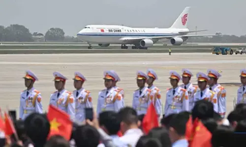 Chinas Xi arrives in Hanoi for State Visit to Vietnam