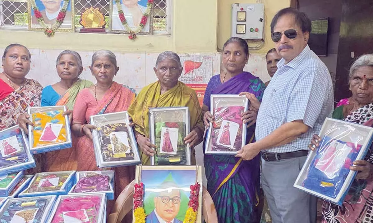 Sarees distributed to women Sarees distributed to women