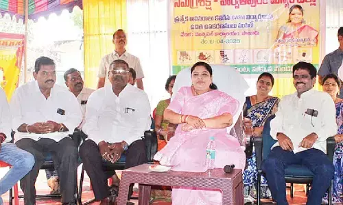 Minister distributes eqpt to needy children