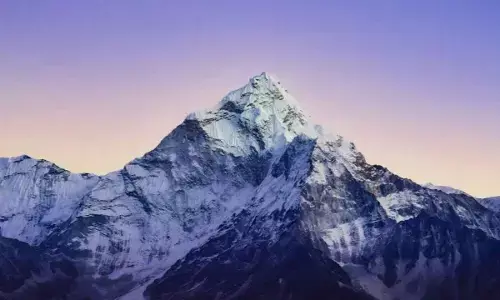 Why does it get colder in the mountains when heat rises?