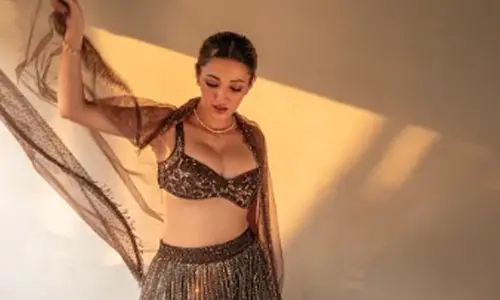 Neha Shetty glows in golden glamour