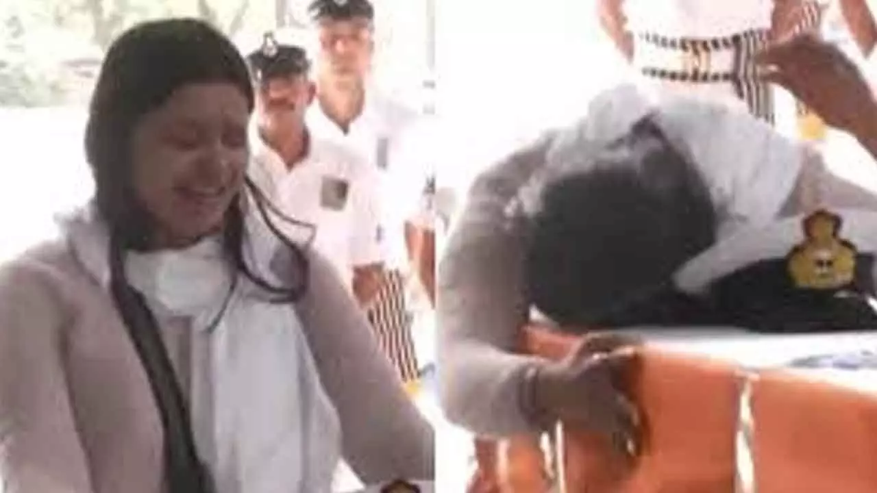 Wife of Lieutenant Vinay bids emotional farewell