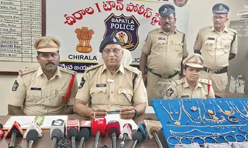 Two held; stolen gold, cash recovered