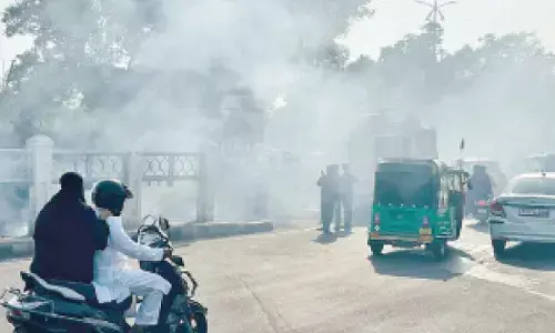 City residents fume with rage over garbage burning