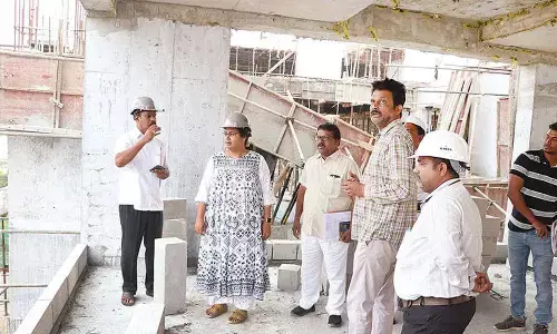 Civic chief inspects TUDA Towers ahead of auction