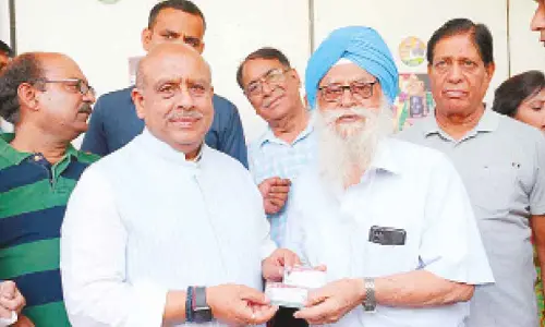 Speaker distributes Ayushman cards