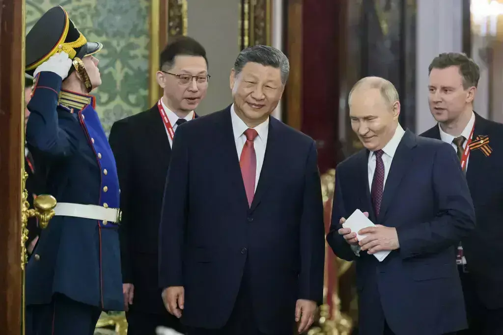 Putin and Xi Condemn U.S. Actions, Vow to Strengthen Russia-China Relations
