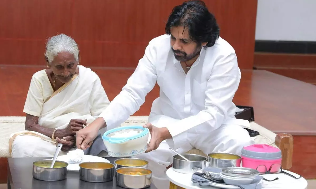 Pawan shares candid time with elderly woman Pawan shares candid time with elderly woman