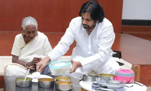 Pawan shares candid time with elderly woman