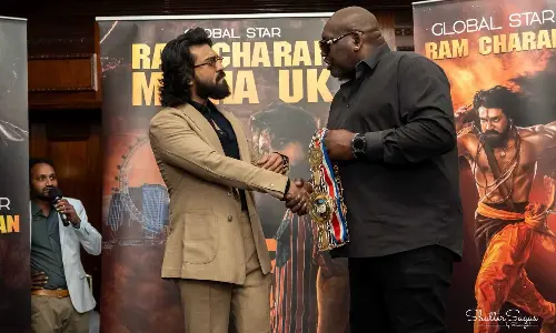 Ram Charan Honors Boxer Julius Francis at London Fan Meet