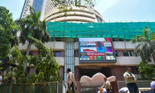 Sensex, Nifty end lower as investors book profits