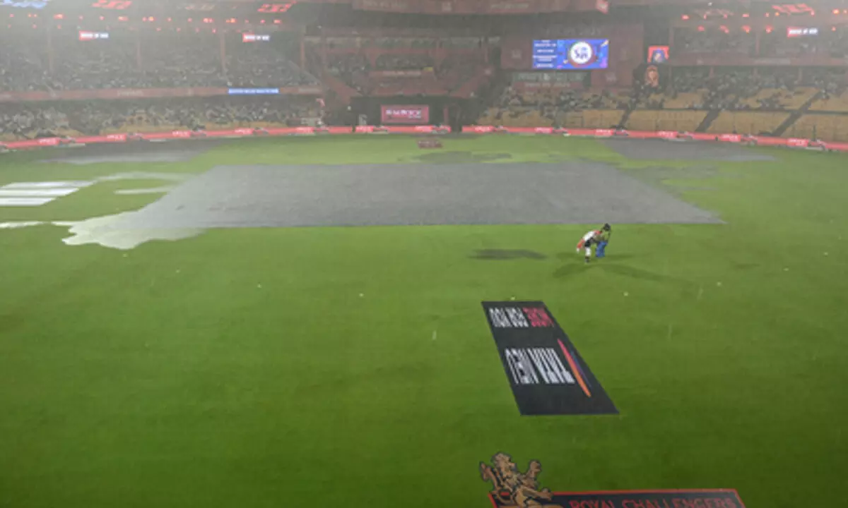 IPL 2025: RCB fans come out in numbers despite rain to hail Kohli on Test retirement IPL 2025: RCB fans come out in numbers despite rain to hail Kohli on Test retirement