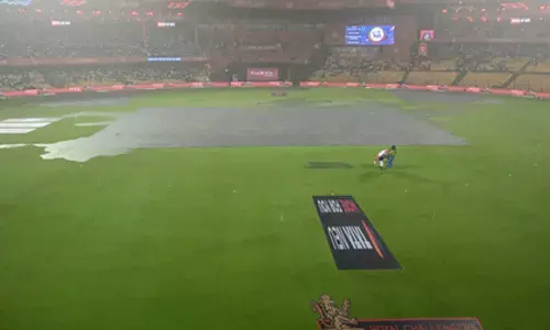 IPL 2025: RCB fans come out in numbers despite rain to hail Kohli on Test retirement