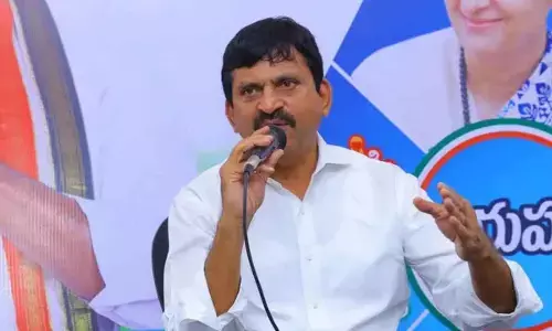 Minister reviews preps for training licensed surveyors