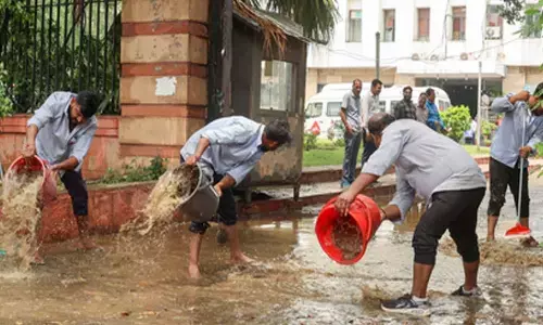 Heavy rain disrupts life in Delhi; flights affected, IMD issues red alert
