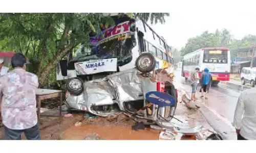 Father, daughter seriously injured in bus-car collision