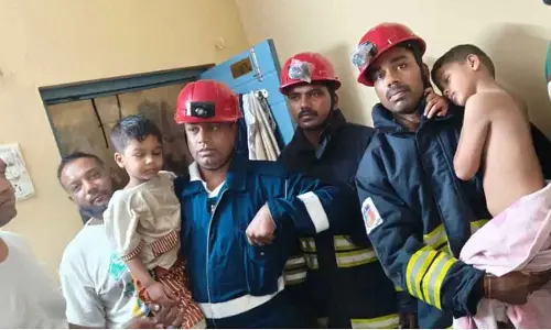 Firefighters rescue two boys locked in room