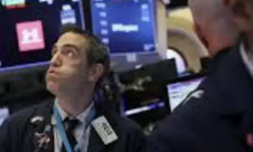 Dow drops 200 points as U.S.-China trade tensions and tariff fears rattle markets