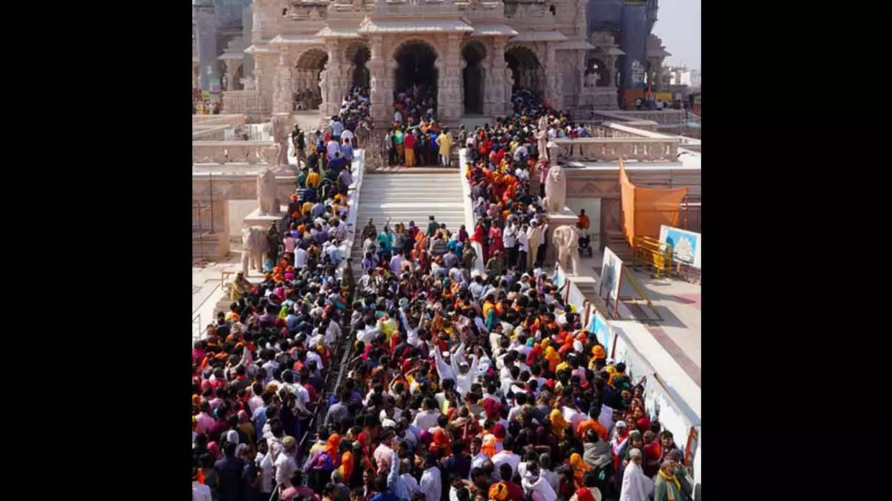 Devotees flock to witness Ram Darbar Pran Pratishtha ceremony in Ayodhya Devotees flock to witness Ram Darbar Pran Pratishtha ceremony in Ayodhya