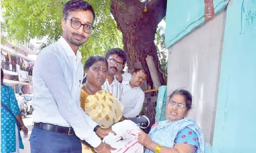 Collector directs home delivery of ration for elderly and disabled