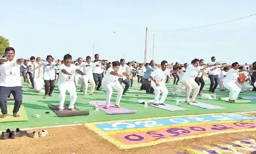 2,000 participate in yoga practice at Tripurantakam