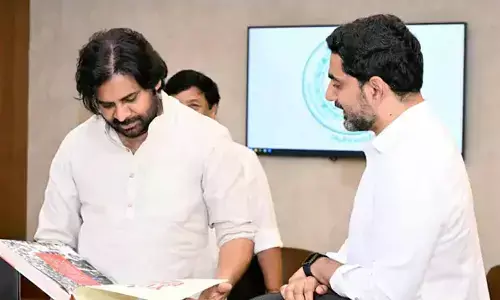 Pawan Kalyan Receives Yuvagalam Padayatra Book from Nara Lokesh