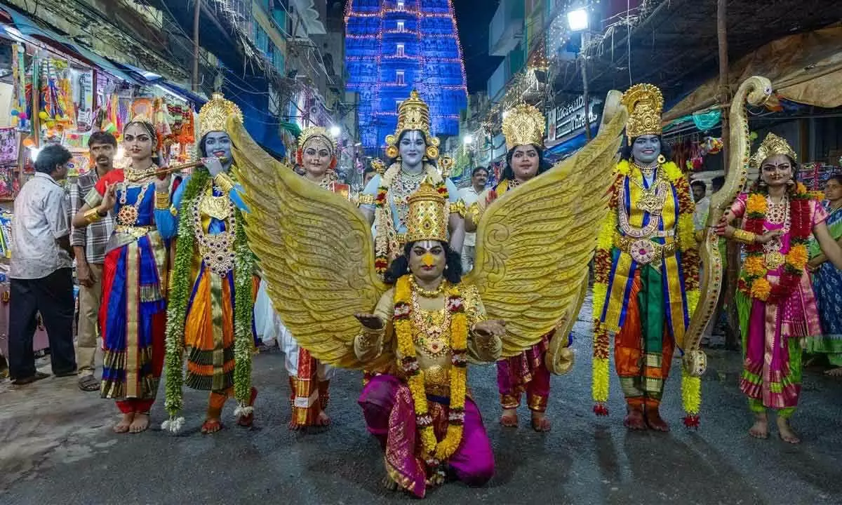 Large number of devotees witness Garuda Vahana Seva Large number of devotees witness Garuda Vahana Seva