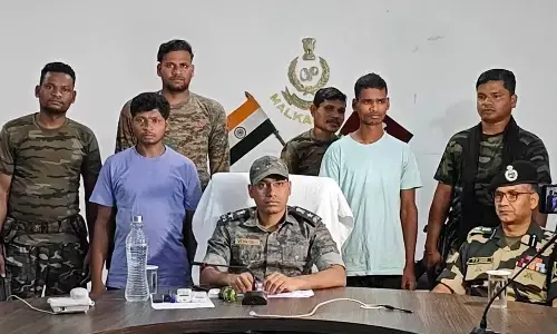 Two top Maoists caught in Malkangiri