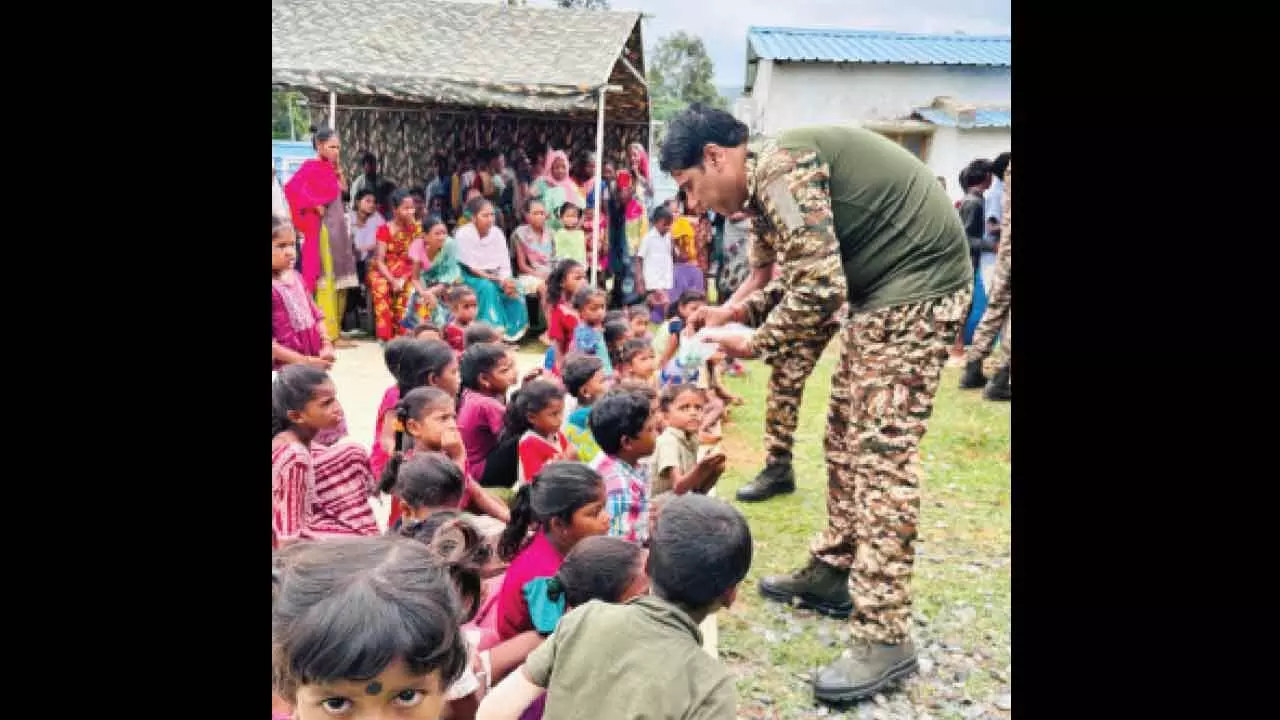 CRPF 212 Bn distributes essentials to tribals CRPF 212 Bn distributes essentials to tribals