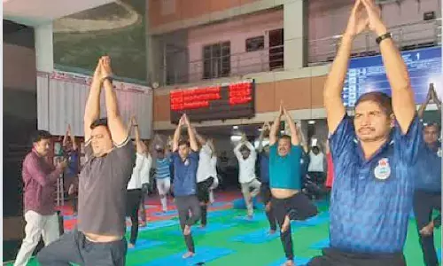 Rly officials, Naval personnel attend yoga session