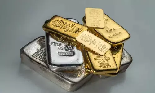 Gold falls Rs 1,200, silver up by Rs 100
