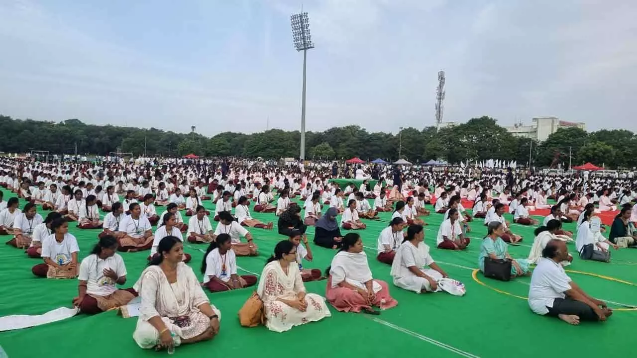 Yoga Enthusiasts Gather at Tatipudi Reservoir for Yogandhra Event
