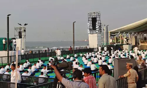 Beach stretches brim with yoga enthusiasts