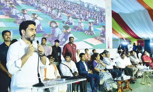 25,000 tribal students perform Surya Namaskaram