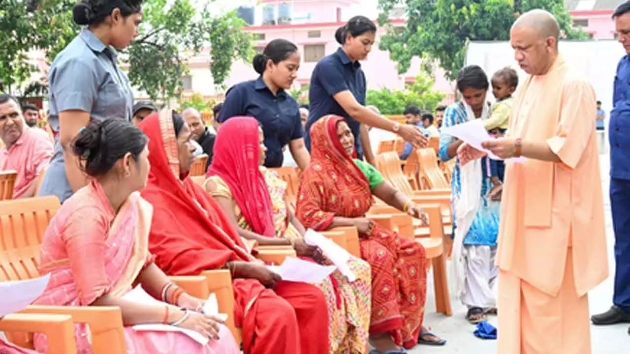 CM Yogi holds Janata Darshan at Gorakhnath temple, assures resolution of issues to over 200 families CM Yogi holds Janata Darshan at Gorakhnath temple, assures resolution of issues to over 200 families