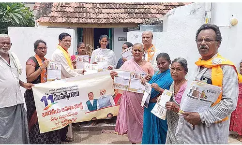 BJP activists take part in door-to-door campaign at Kovvada